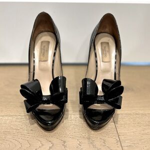 Valentino black patent bow